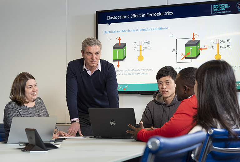 (left to right) Amy Thompson, George Bollas, Xi Yang,David Tamim Manan, and Chen Chen in a presentation room at the IPB (Innovation Partnership Building) on Feb. 5, 2019. (Al Ferreira/UConn Photo)