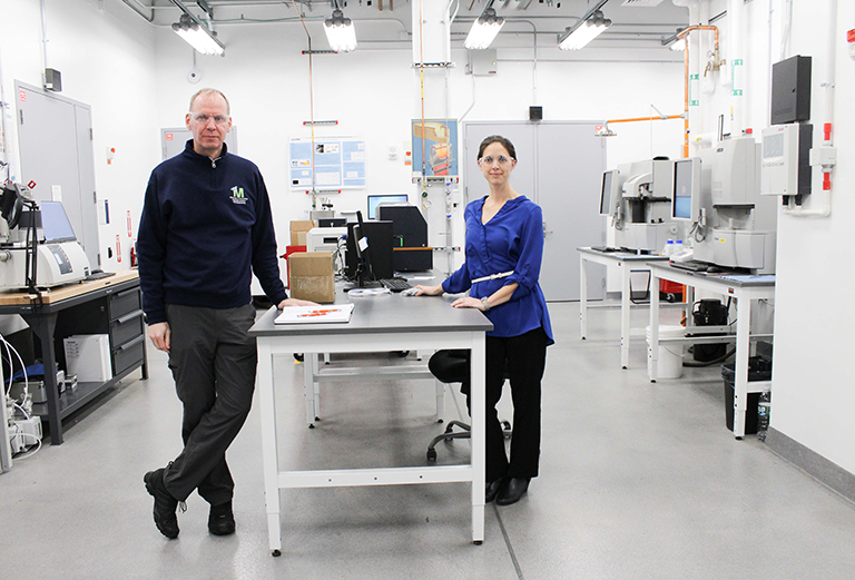 photo of Prof. Lesley Frame, CMPD Director, at the Pratt & Whitney Additive Manufacturing Center (PW AMC), UConn Tech Park, with Center Director Prof. Rainer Hebert.