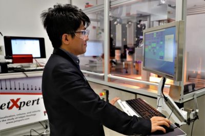 SHAP3D director working on 3D printer