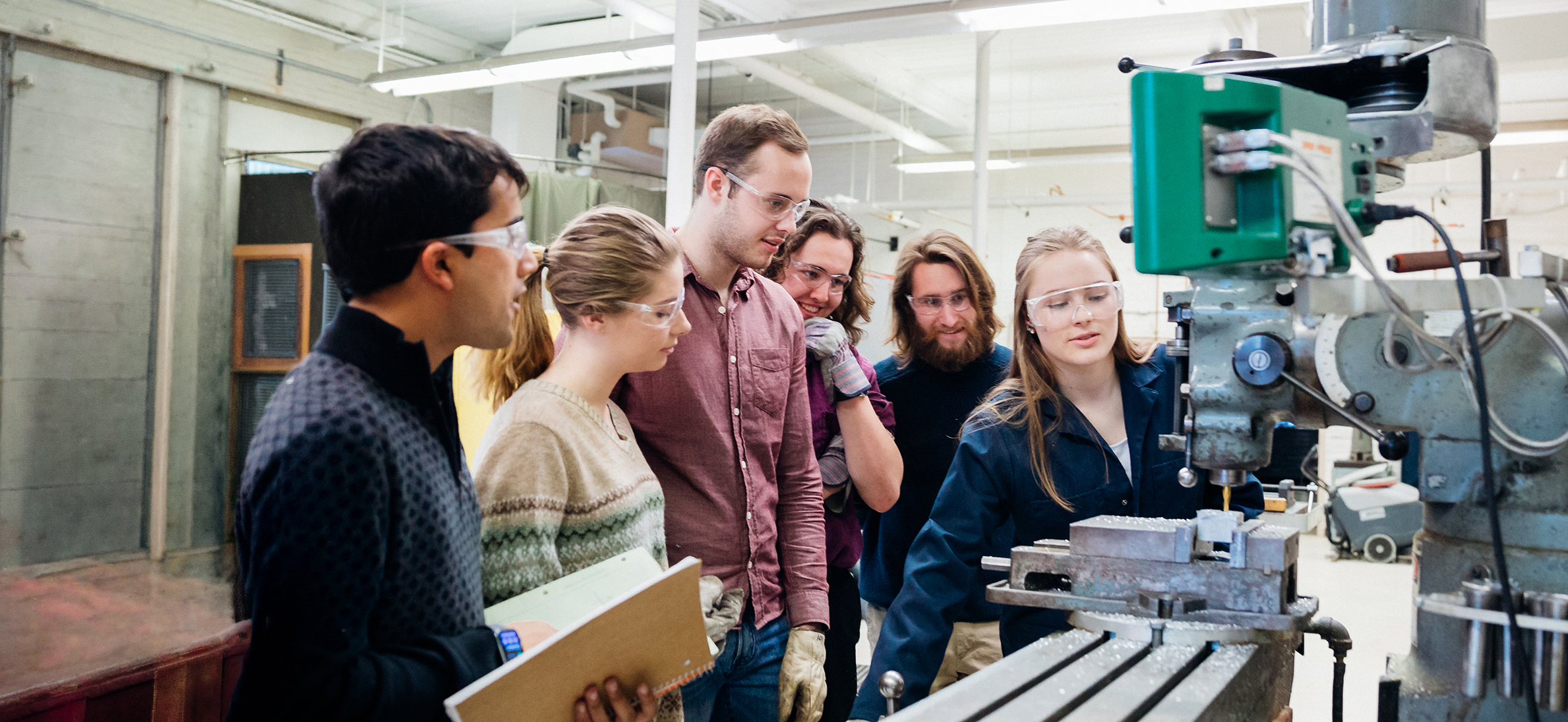 Research students working as team in an Engineering Workshop